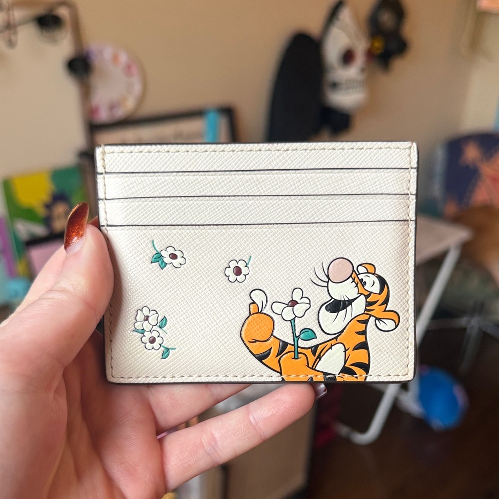 Kate Spade Cream Card Holder with Tigger Design